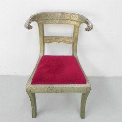 Dining chair upholstered with stamped tin, 1920s front