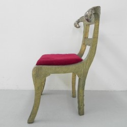 Dining chair upholstered with stamped tin, 1920s side