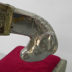 Dining chair upholstered with stamped tin, 1920s detail